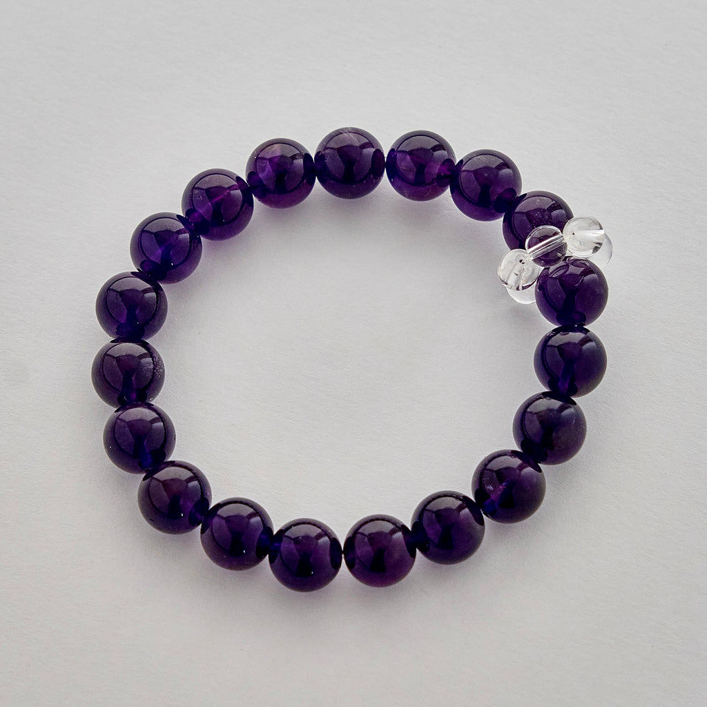Midnight Violet – Amethyst Bracelet with Clear Quartz Accent | Calm · Intuition · Protection